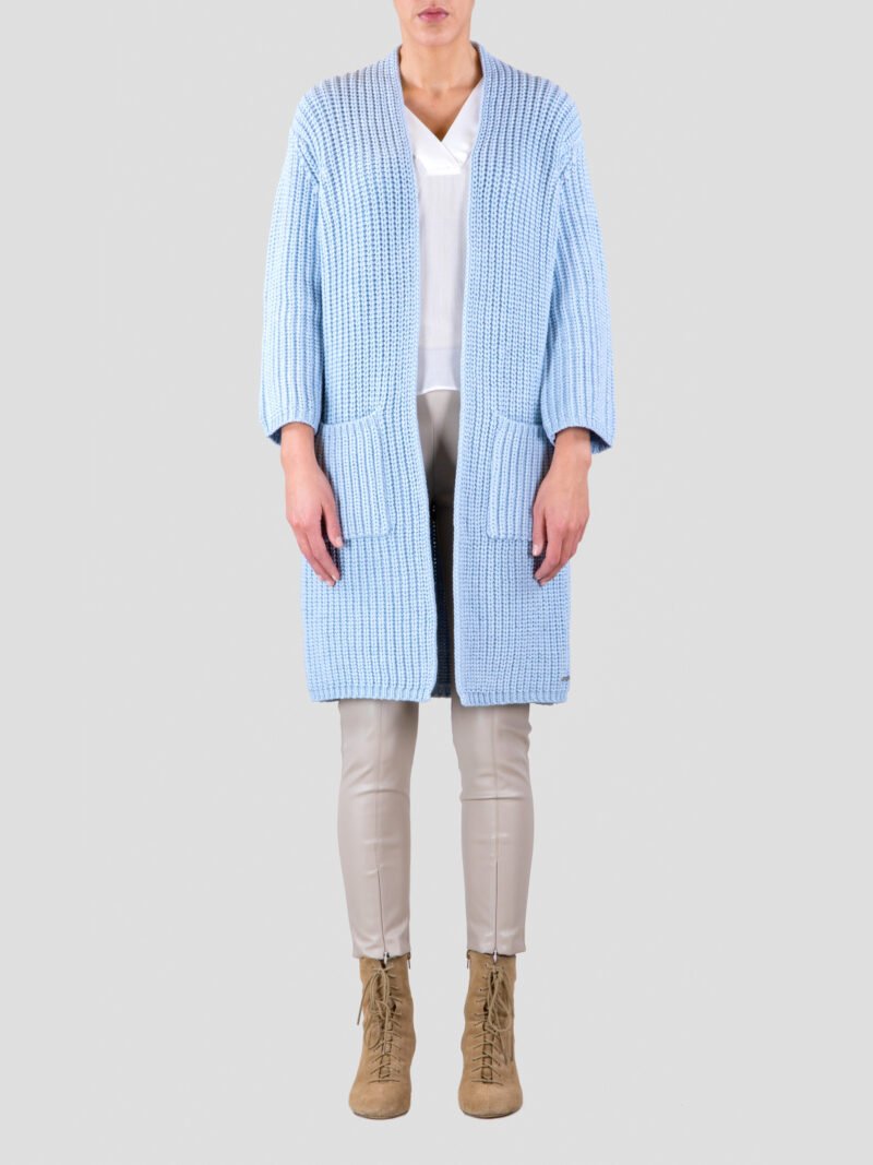 model wearing blue long knitted vest